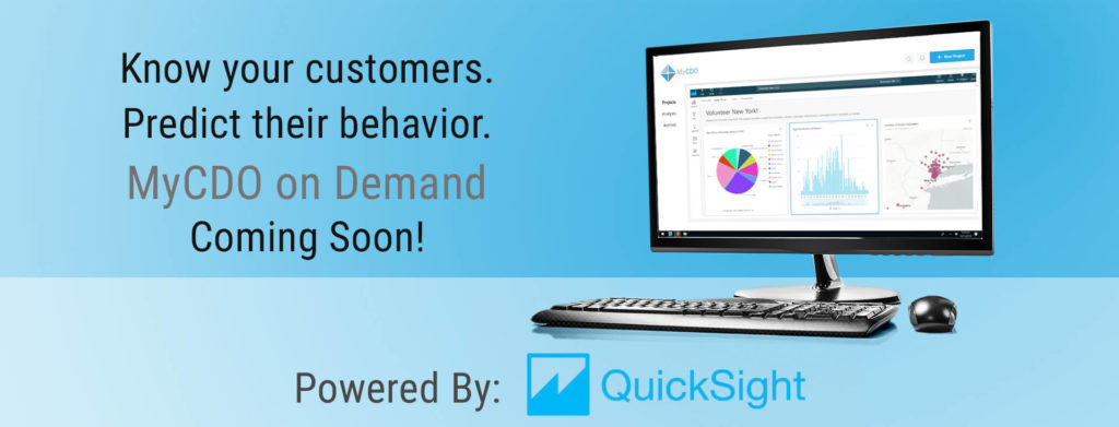 a monitor and keyboard with a text in the bottom of "powered by quicksight"