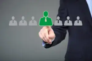 a man's hand pointing a logo of man